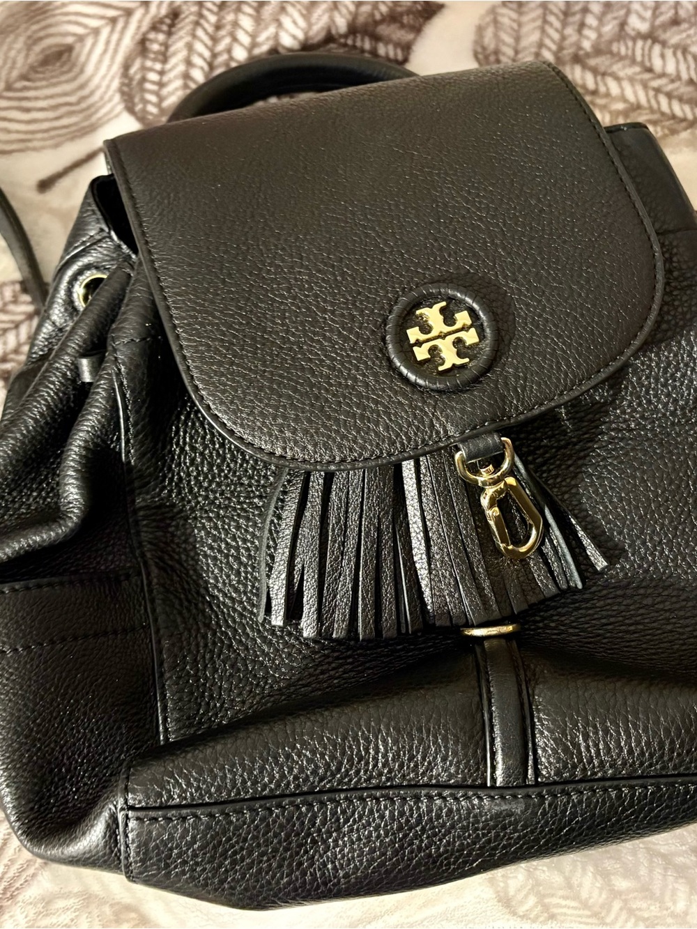Tory Burch Black Pebbled Leather Tassel Backpack with Gold Hardware
